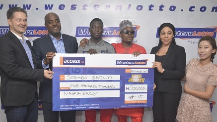 Qadim (c) with Elvis Krivokuca, Yomi Ogunfowora, Olamide, Anita Osadebe and Lucy Lee at Western Lotto presentation of N.5m cheque